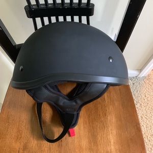 Black motorcycle half helmet. DOT approved.